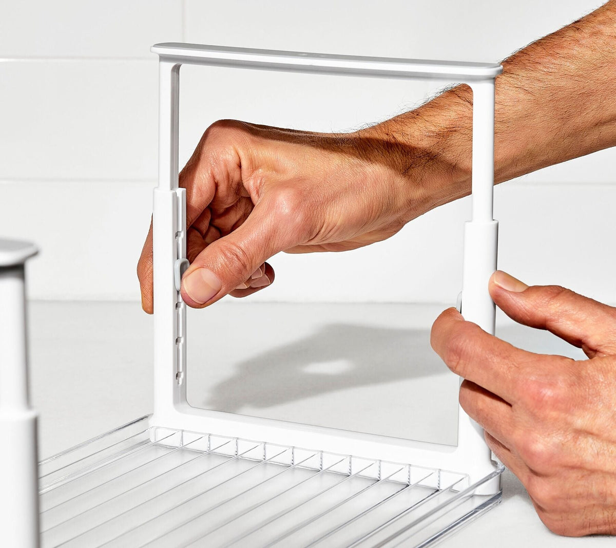 adjustable-refrigerator-shelf-riser-q0 gg_13347000_fridgeorgshelfriser_33_p.jpg