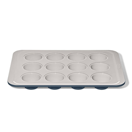 non-stick-pro-ceramic-coated-metal-bakeware-12-cup-muffin-pan-storm-blue-q4 oxo_12-cup-muffin-pan-stormblue_apdp_00_main.jpg