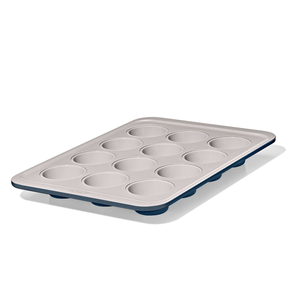 non-stick-pro-ceramic-coated-metal-bakeware-12-cup-muffin-pan-storm-blue-q4 oxo_12-cup-muffin-pan-stormblue_pdp_02.jpg